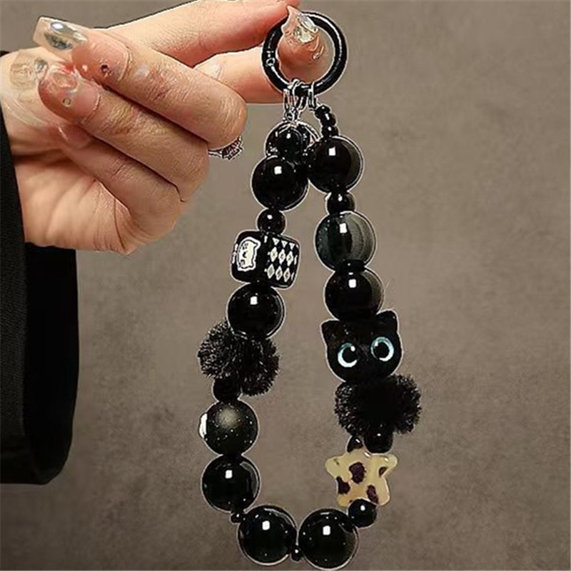 Luxury Bags And Accessories - Modisches Handy-Zubehör Luxuriöser Schwarzer Flauschiger Katzen-Handyanhänger